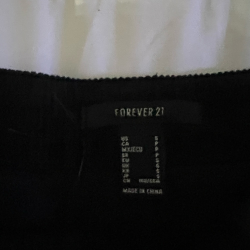 Black jean/velvet material skirt. - Picture 3 of 3